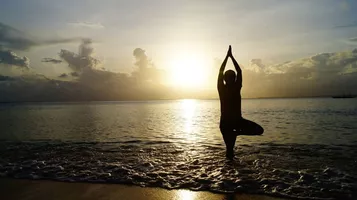 Yoga sur la plage & petit-déjeuner Yoga sur la plage & petit-déjeuner